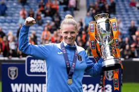 Glasgow City manager Leanne Ross celebrates with the SWPL trophy after the 1-0 win over Rangers at Ibrox. (Photo by Paul Devlin / SNS Group)