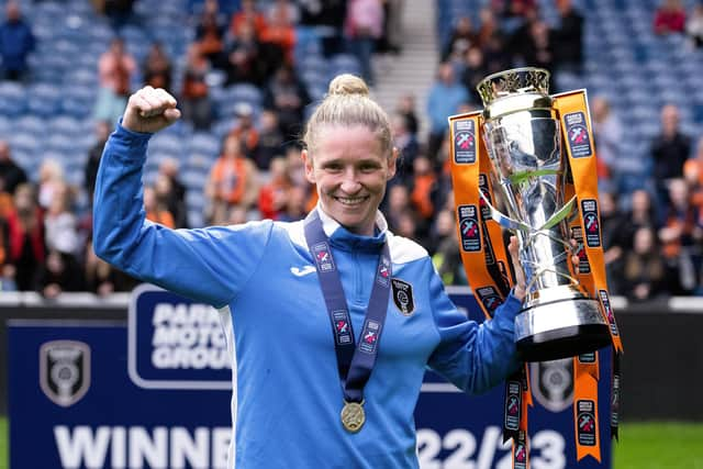 Glasgow City manager Leanne Ross celebrates with the SWPL trophy after the 1-0 win over Rangers at Ibrox. (Photo by Paul Devlin / SNS Group)