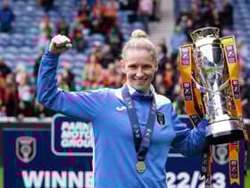 Glasgow City manager Leanne Ross celebrates with the SWPL trophy after the 1-0 win over Rangers at Ibrox. (Photo by Paul Devlin / SNS Group)