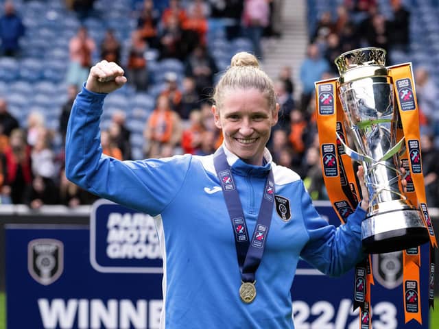 Glasgow City manager Leanne Ross celebrates with the SWPL trophy after the 1-0 win over Rangers at Ibrox. (Photo by Paul Devlin / SNS Group)