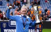 Glasgow City manager Leanne Ross celebrates with the SWPL trophy after the 1-0 win over Rangers at Ibrox. (Photo by Paul Devlin / SNS Group)