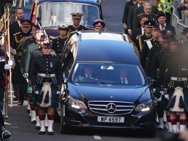 King Charles III and members of the royal family join the procession of Queen Elizabeth's coffin from the Palace of Holyroodhouse to St Giles' Cathedral, Edinburgh.Picture date: Monday September 12, 2022.