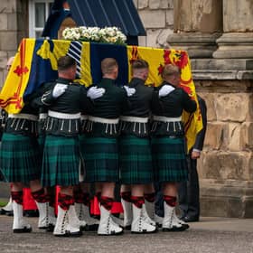 The Princess Royal curtseys before the coffin of Queen Elizabeth II as it arrives at the Palace of Holyroodhouse last Sunday after she followed her mother in the funeral cortege from Balmoral to Edinburgh. PIC: WPA Pool.
