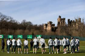 The Celtic players take coaching instructions during their training session ahead of facing Hearts.