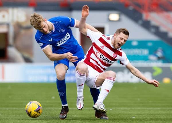 Hamilton's Bruce Anderson (R) is fouled by Rangers' Filip Helander during a Scottish Premiership match between Hamilton Academical and Rangers at the FOYS Stadium, on February 07, 2021, in Hamilton, Scotland. (Photo by Alan Harvey / SNS Group)