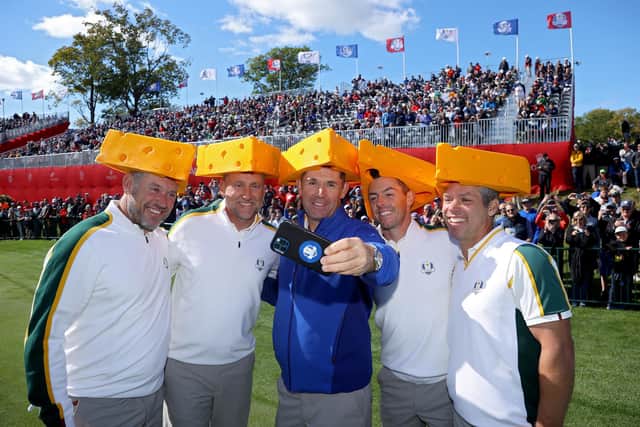 Europeans, from left, Lee Westwood, Ian Poulter, captain Padraig Harrington, Rory McIlroy and Paul Casey pose with foam cheese hats during a practice round prior to the 43rd Ryder Cup at Whistling Straits. (Photo by Andrew Redington/Getty Images)