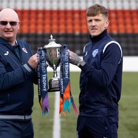 Raith manager John McGlynn and Queen of the South player/manager Willie Gibson with the SPFL Trust Trophy.  (Photo by Alan Harvey / SNS Group)