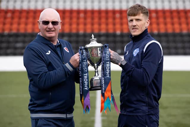 Raith manager John McGlynn and Queen of the South player/manager Willie Gibson with the SPFL Trust Trophy. (Photo by Alan Harvey / SNS Group)