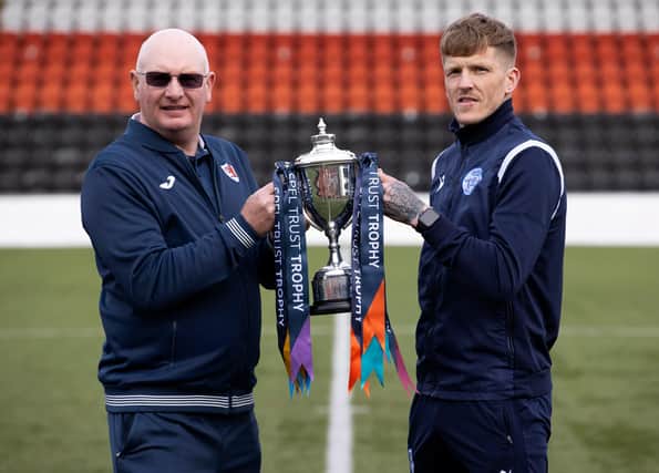 Raith manager John McGlynn and Queen of the South player/manager Willie Gibson with the SPFL Trust Trophy. (Photo by Alan Harvey / SNS Group)