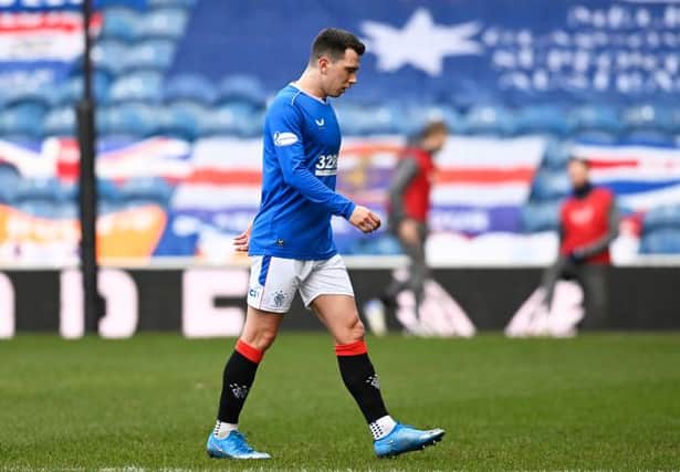 Ryan Jack cuts a disconsolate figure as he leaves the pitch after just 27 minutes of Rangers' Premiership match against Dundee United at Ibrox. (Photo by Rob Casey / SNS Group)