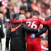Andy Robertson limps off the pitch during Liverpool's friendly against Atletic Bilbao.