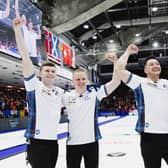 Scotland celebrate their win over Canada at the World Championships.