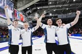 Scotland celebrate their win over Canada at the World Championships.