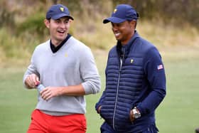 PGA Tour policy board members Patrick Cantlay and Tiger Woods chat during the 2019 Presidents Cup in Australia. Picture: William West//AFP via Getty Images.