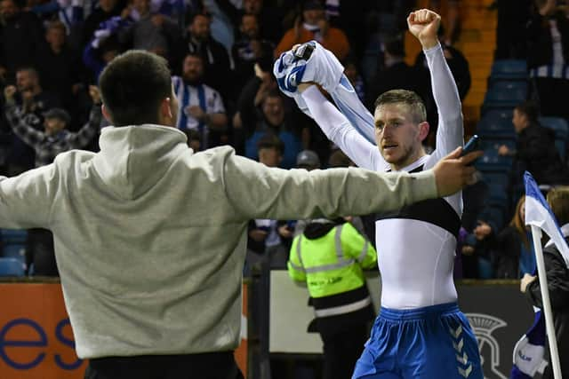 KILMARNOCK, SCOTLAND - APRIL 22: Kilmarnock's Blair Alston celebrates making it 2-1 during a cinch Championship match between Kilmarnock and Arbroath at Rugby Park, on April 22, 2022, in Kilmarnock, Scotland.  (Photo by Ross MacDonald / SNS Group)