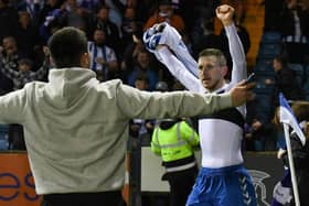KILMARNOCK, SCOTLAND - APRIL 22: Kilmarnock's Blair Alston celebrates making it 2-1 during a cinch Championship match between Kilmarnock and Arbroath at Rugby Park, on April 22, 2022, in Kilmarnock, Scotland.  (Photo by Ross MacDonald / SNS Group)
