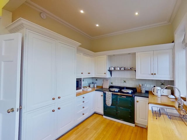 Interior: The townhouse’s ground floor comprises a sitting room and open-plan kitchen-diner. A staircase, well-lit from a beautiful cupola, leads to the first floor which has a lounge, bedroom and bathroom. Bedrooms two and three are on the garden level.