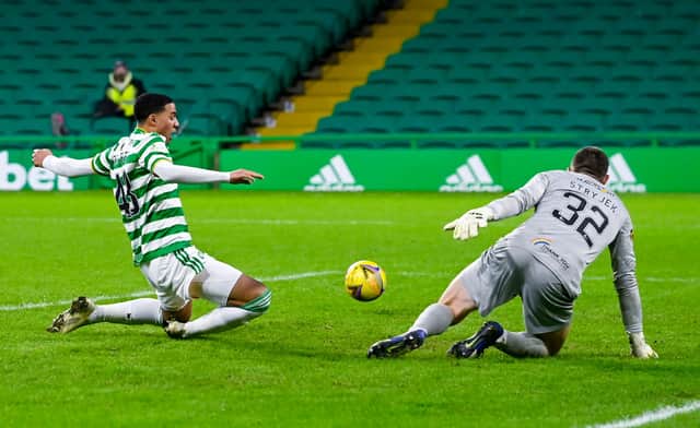 Celtic's Armstring Oko-Flex just can't reach an Anthony Ralston cross in one of the closest calls in a dreary draw against Livnigston for the depleted Parkead side. (Photo by Rob Casey / SNS Group)