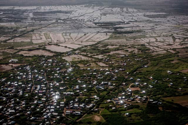 Flooded homes and fields in Beledweyne, Somalia, which has been experiencing cycles of floods and drought in recent years (Picture: Luis Tato/AFP via Getty Images)