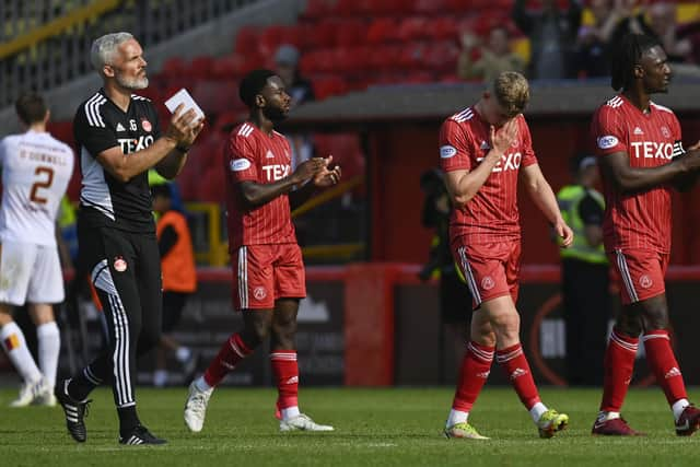 Aberdeen players applaud the fans after losing to Motherwell. (Photo by Rob Casey / SNS Group)