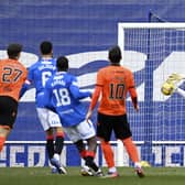Allan McGregor makes a save from Louis Appere's strike during a Scottish Premiership match between Rangers and Dundee United at Ibrox on February 21, 2021, in Glasgow, Scotland (Photo by Rob Casey / SNS Group)