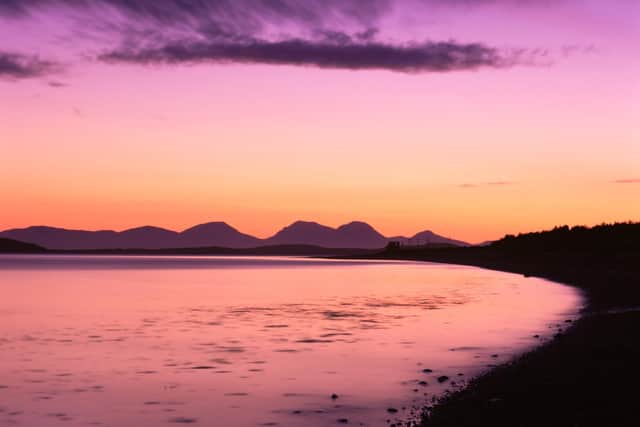 The view across the sound of Gigha, to the Paps of Jura at sunset. Picture: VisitScotland