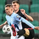 Slovenia's midfielder Josip Ilicic (L) fights for the ball with and Croatia's defender Borna Barisic during the FIFA World Cup Qatar 2022 Group H qualification football match between Slovenia and Croatia at The Stozice Stadium in Ljubljana, Slovenia. (Photo by JOE KLAMAR/AFP via Getty Images)