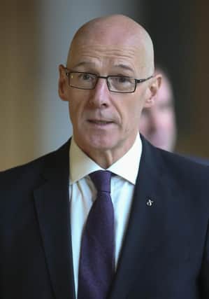A vote of no confidence in Deputy First Minister John Swinney has failed.