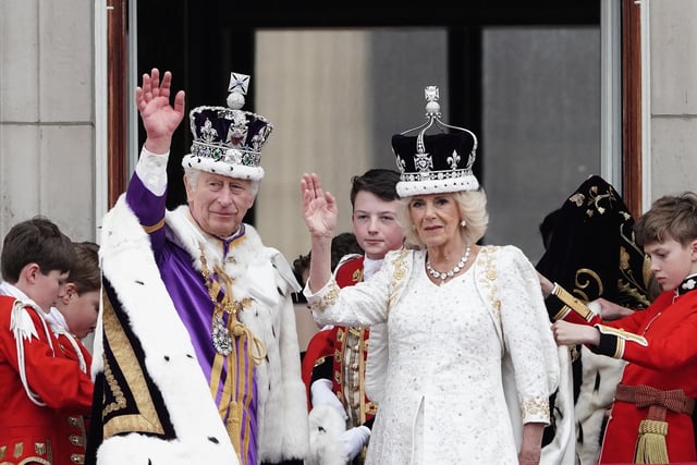 King Charles III and Queen Camilla on the balcony of Buckingham Palace, London, following the coronation.