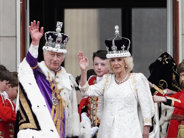 King Charles III and Queen Camilla on the balcony of Buckingham Palace, London, following the coronation.