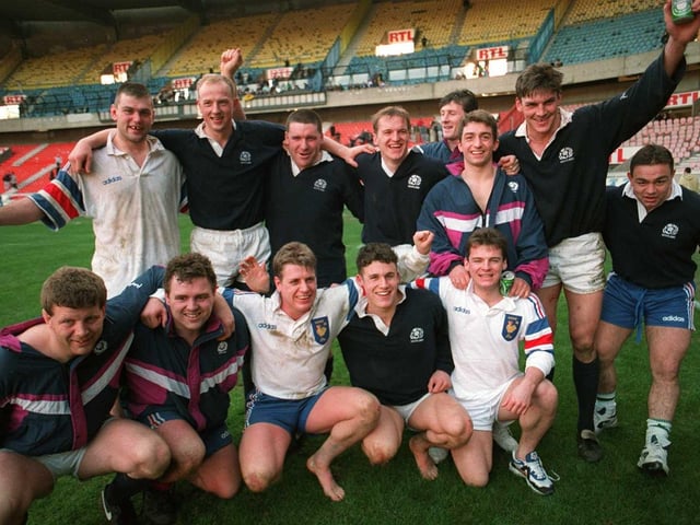 Some of the Scotland team celebrate the famous 23-21 away win over France in 1995. It was the Scots' first ever win at the Parc des Princes and their first win in Paris since 1969.
