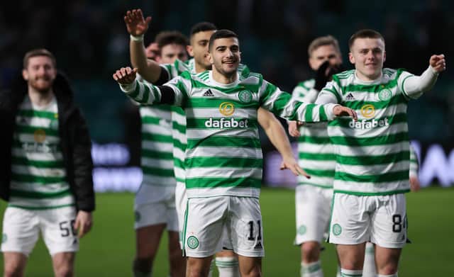 Liel Abada leads the Celtic celebrations after the win over Dundee United.