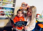 Families have been supported by our partnership with Dolly Parton's Imagination Library - two-year-old Callie and her mother Leigh Stewart