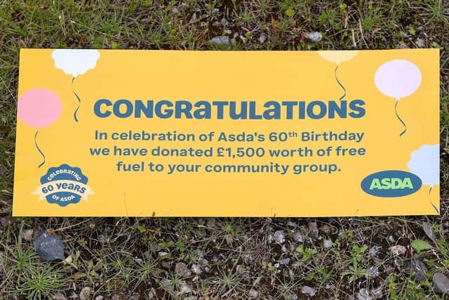 Asda Coatbridge surprises Lanarkshire Cancer Care Trust with a lucky 'Golden Ticket' for £1,500 worth of free fuel.