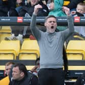 Motherwell Manager Graham Alexander celebrates after the draw against Livingston.