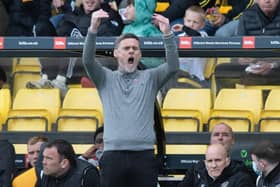 Motherwell Manager Graham Alexander celebrates after the draw against Livingston.