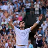 Cameron Norrie breathes hard after the titantic tussle with David Goffin, a victory which takes him into the Wimbledon semi-finals.