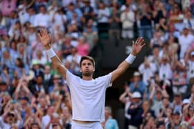 Cameron Norrie breathes hard after the titantic tussle with David Goffin, a victory which takes him into the Wimbledon semi-finals.