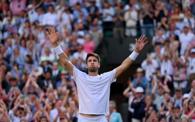 Cameron Norrie breathes hard after the titantic tussle with David Goffin, a victory which takes him into the Wimbledon semi-finals.