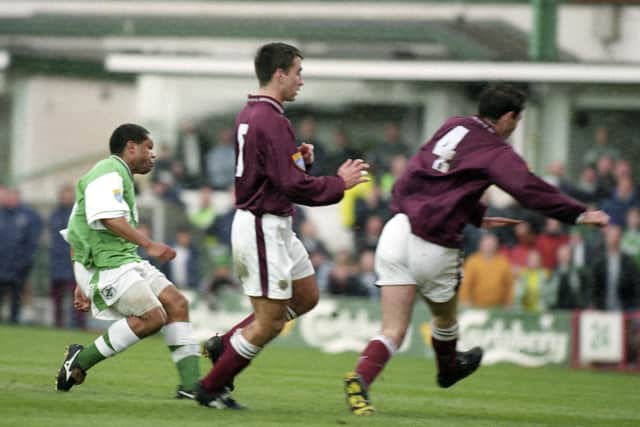 Kevin Harper scores the winning goal for Hibs in a derby against Hearts in April 1998.