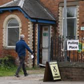 A man arrives to cast his vote at Burrelton and Woodside Village Hall polling station during yesterday's election (Picture: Jeff J Mitchell/Getty Images)
