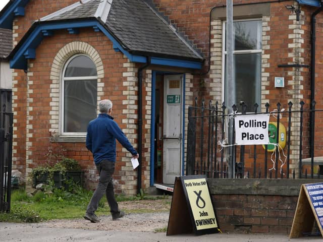 A man arrives to cast his vote at Burrelton and Woodside Village Hall polling station during yesterday's election (Picture: Jeff J Mitchell/Getty Images)