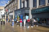 People queue outside the flagship Scottish Primark store on Princes Street in Edinburgh after it reopened following the initial spring 2020 lockdown. Picture: Jane Barlow/PA Wire