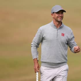 Adam Scott acknowledges the crowd on the 18th green during day two of the 150th Open at St Andrews. Picture: Harry How/Getty Images.