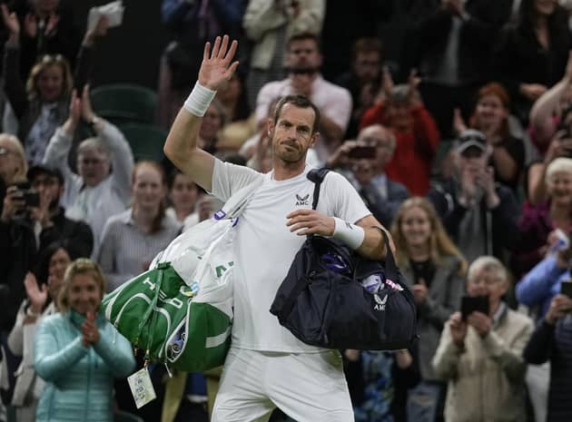 Andy Murray takes his leave of Centre Court after his second-round defeat