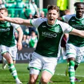 Hibs striker Kevin Nisbet celebrates after scoring the winner against Hearts. (Photo by Paul Devlin / SNS Group)