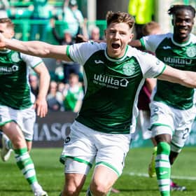 Hibs striker Kevin Nisbet celebrates after scoring the winner against Hearts. (Photo by Paul Devlin / SNS Group)