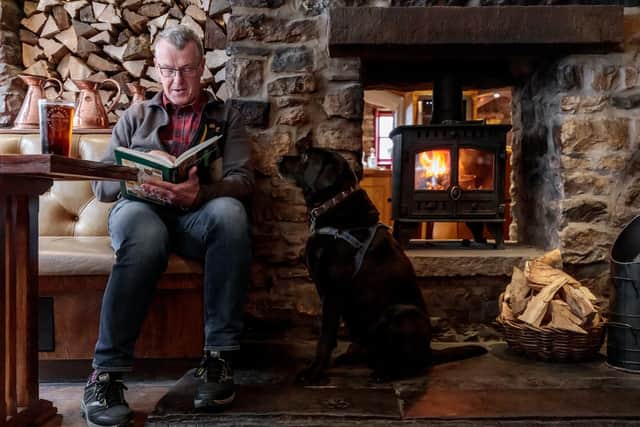 Reading shaggy dog stories at The Sun Inn, Kirby Lonsdale, Cumbria. Pic: PA Photo/Sun Inn.