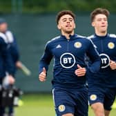 Striker Che Adams leading the way during a Scotland training session at Oriam in Edinburgh ahead of Wednesday night's World Cup play-off semi-final against Ukraine at Hampden.  (Photo by Paul Devlin / SNS Group)