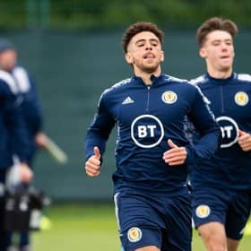 Striker Che Adams leading the way during a Scotland training session at Oriam in Edinburgh ahead of Wednesday night's World Cup play-off semi-final against Ukraine at Hampden.  (Photo by Paul Devlin / SNS Group)